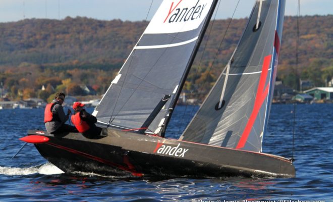 SPEEDDREAM, a prototype of what aims to be the world's fastest sailboat, reaches across Rockland Harbor. Note the bulb keel!