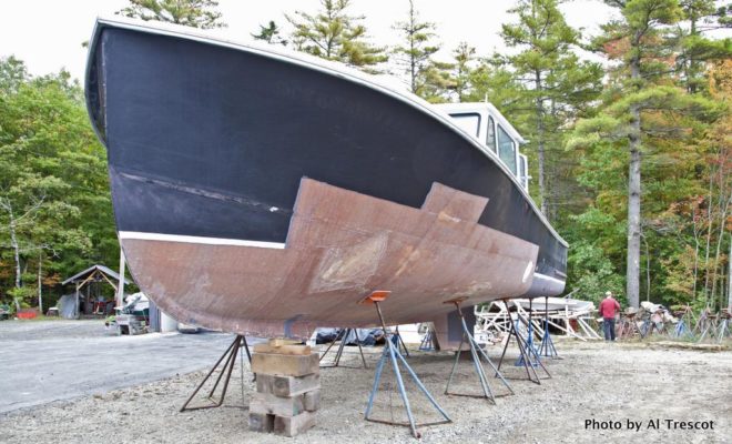 The first order of business for Farrin's Boatshop was to repair where the boat had been holed on a Maine ledge.