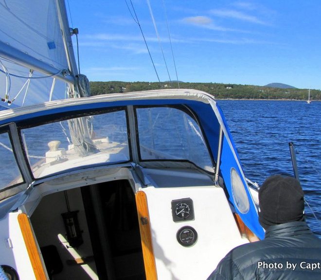 The hat and down parka are part of fall sailing in Maine — and we wouldn't trade it for the world.