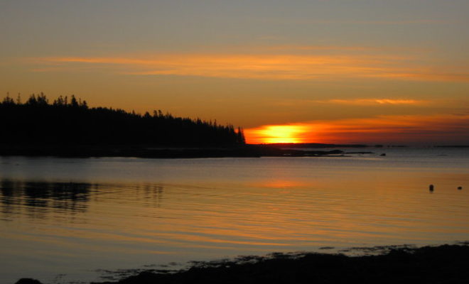A late December sunrise creeps over Mosquito Harbor.