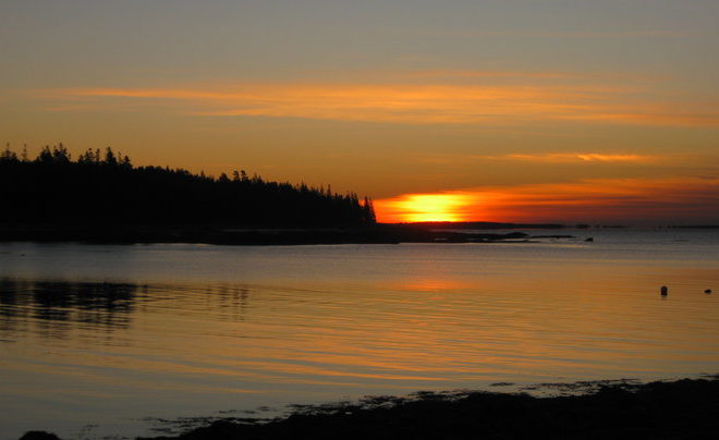 A late December sunrise creeps over Mosquito Harbor.