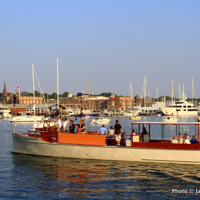 The charter boat Rum Runner II cruising Newport Harbor