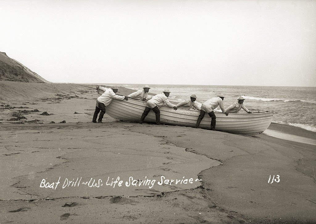 A six-man drill crew with surf boat.