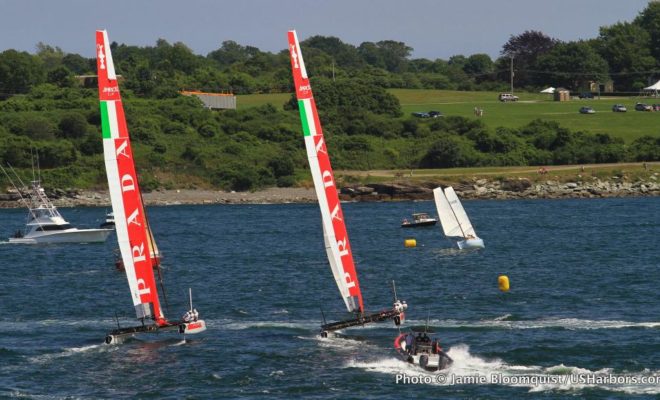 A pair of high-speed catamarans racing in Narragansett Bay during the 2012 America's Cup World Series event. A pair of high-speed catamarans racing in Narragansett Bay during the 2012 America's Cup World Series event.