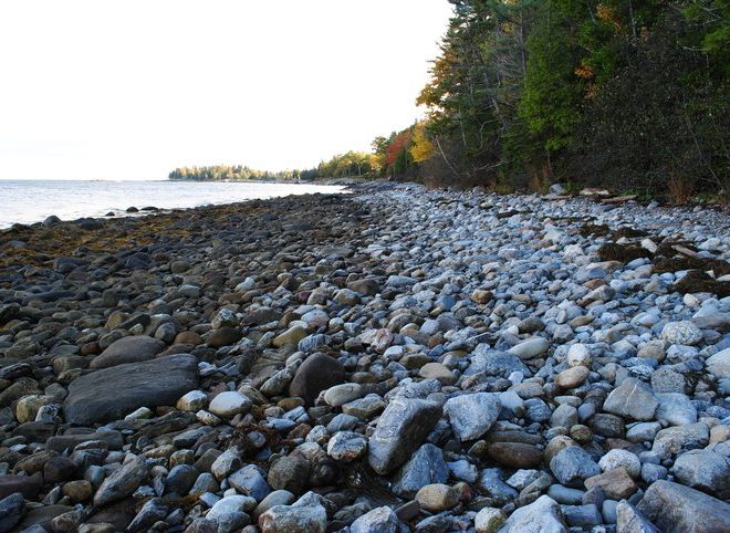 The rocky beach at the end of the Aldermere Farm path has an amazing view across to the outer islands of Penobscot Bay.