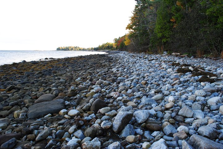 The rocky beach at the end of the Aldermere Farm path has an amazing view across to the outer islands of Penobscot Bay.
