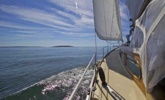 After coasting close through the lee of Millet Island, we pick up the freshening breeze on the other end.