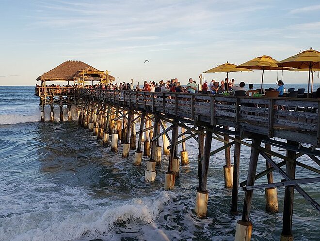 Cocoa Beach Pier, FL - Cathylaurenzi, CC BY-SA 4.0 , via Wikimedia Commons