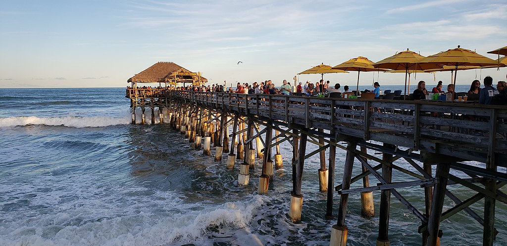 Cocoa Beach Pier, FL - Cathylaurenzi, CC BY-SA 4.0 , via Wikimedia Commons