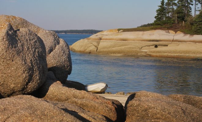 One of the many watery threads through the pink granite of Merchants Row. Photo by Tom Young/USHarbors.com.