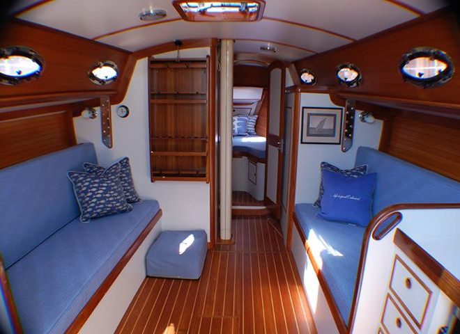 This Marblehead boat, a 38-foot Alerion, had a new interior installed including cushions with luxury foam, drapes, and blankets.