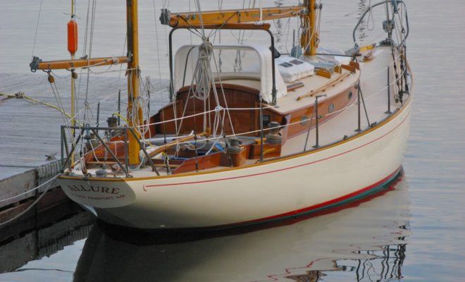 The Concordia Yawl tied to a dock in New England is a typical, and apparently timeless, sight.