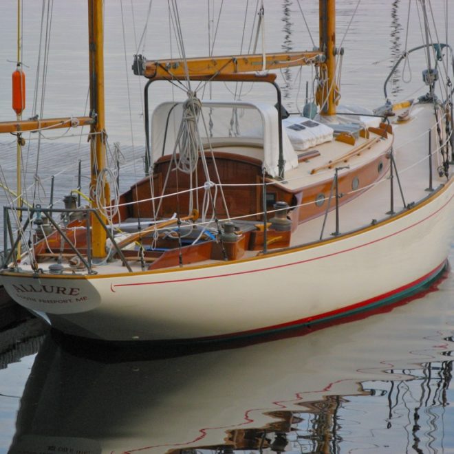 The Concordia Yawl tied to a dock in New England is a typical, and apparently timeless, sight.