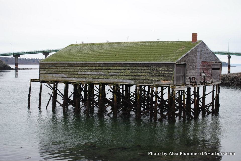 An old sardine shack stands in front of the bridge to Campobello Island in Lubec.
