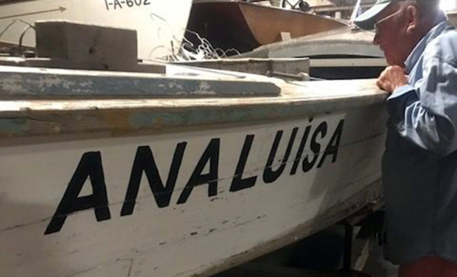 John Coyle ponders the Analuisa, a former fishing boat from Mariel, Cuba in which two families escaped to the U.S.