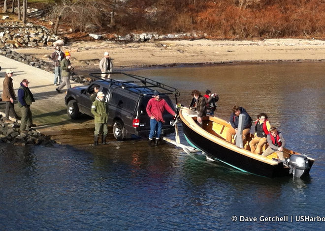 A 17' work skiff makes its way into the water at the Apprenticeshop in Rockland, Maine, on Dec. 16.