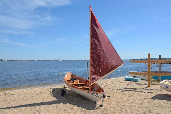 With the addition of an optional sail rig, the Dory performs well and handles easily under sail.