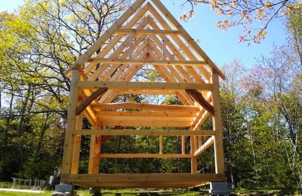 A 14' x 16' tiny timber frame raised by hand in Brooksville, ME. Image courtesy Black Dog Timberworks.