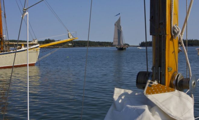 The schooner Nathaniel Bowditch sails into Burnt Coat Harbor. Schooner American Eagle is at left.