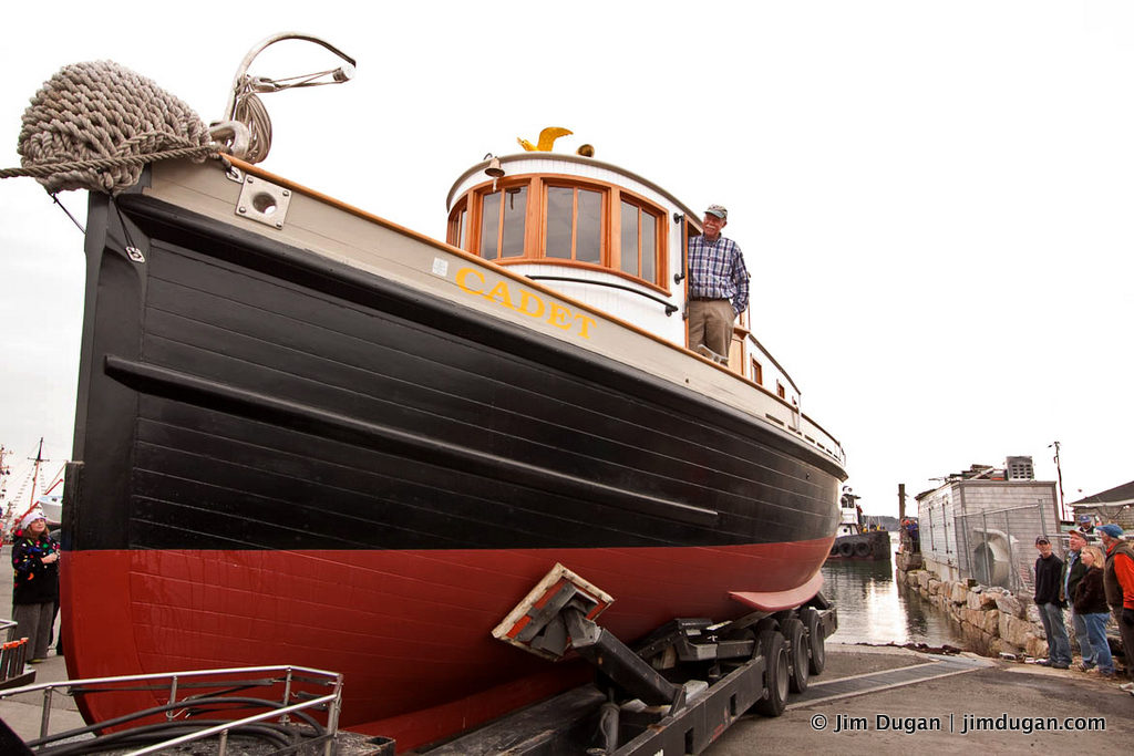 Capt. John Foss stands aboard the tugboat Cadet, which he rebuilt over a 10-year period.