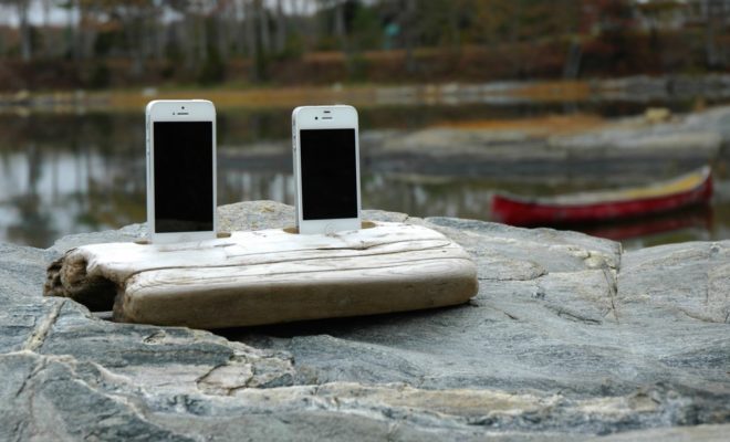 Docksmith: Driftwood docking stations for smartphones and tablets.  Image by Olivia Turrell.