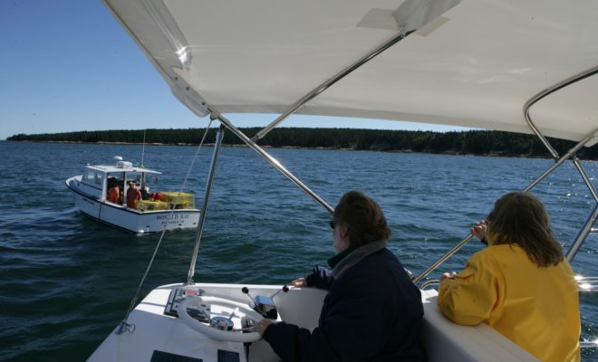 Don and Wanda Ellis checking in on their son, Anthony, fishing the waters of Blue Hill Bay in his Ellis 36