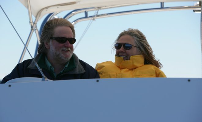 Don Ellis, Ellis Boat Company president with Wanda Ellis on the flybridge of an Ellis 36