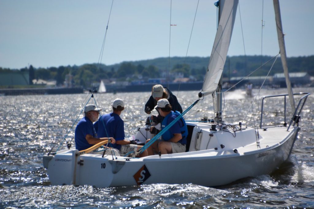 Sailing in the J-22s. The MBHH team plots strategy between races. Photo by Ann-e Blanchard