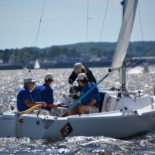 Sailing in the J-22s. The MBHH team plots strategy between races. Photo by Ann-e Blanchard