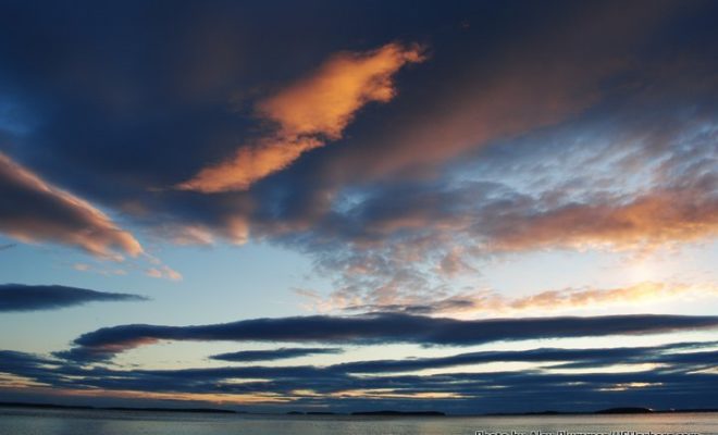 Early morning clouds seem to dance over the islands of Penobscot Bay. From left, Job, Lime, Lasalle, Saddle, and Mark Islands.