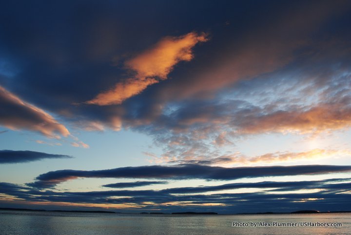 Early morning clouds seem to dance over the islands of Penobscot Bay. From left, Job, Lime, Lasalle, Saddle, and Mark Islands.