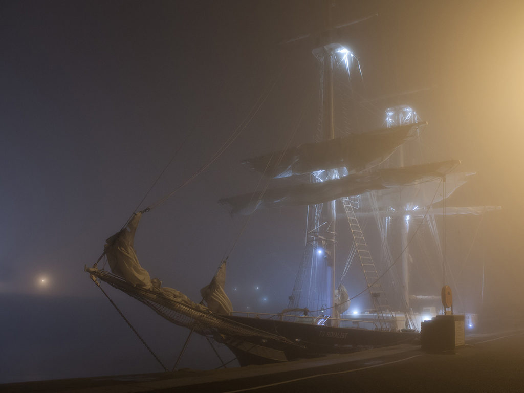 Fog and light can turn any ship into a ghost story - photo by Tanya Hart