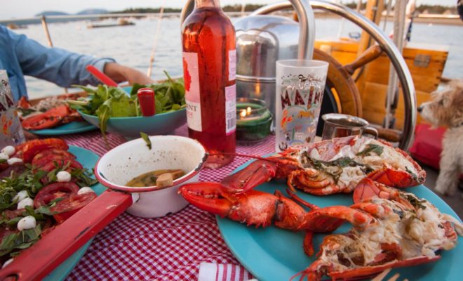 After a full day exploring the big harbor and islands, a floating table for two on Cranberry Harbor at dusk, is the highlight.