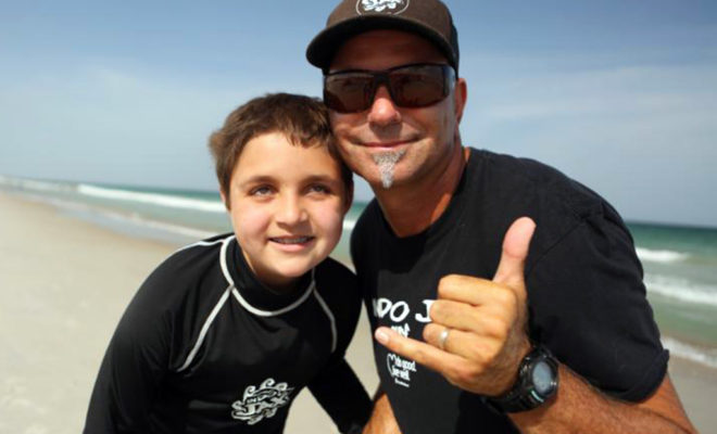 Jaylen Stanley with Jack Viorel - Visually Impaired Surf Camp - Courtesy Chris Davis