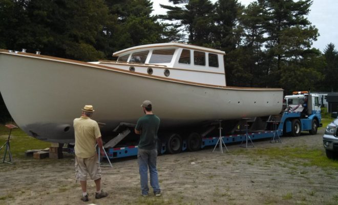 TWIST, a 45-foot American lobster yacht rebuilt by South Shore Boatworks, being moved outside.