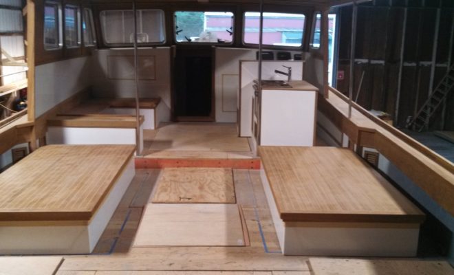 interior showing galley see-tee and teak deck boxes