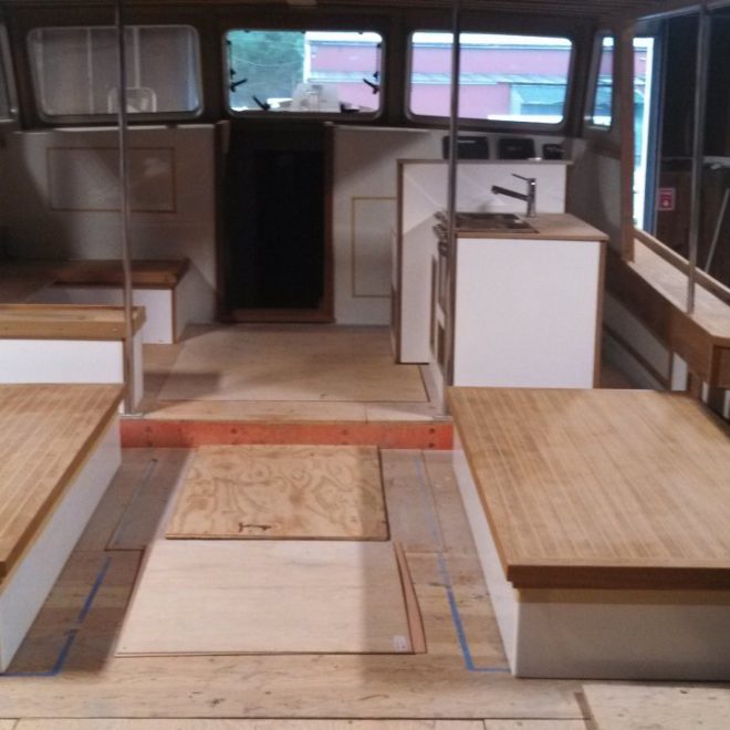 interior showing galley see-tee and teak deck boxes