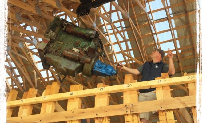 A careful pick...GIBY's systems tech, Steve Dee, removing the old generator.