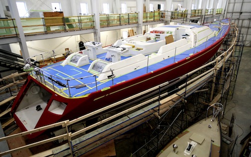 The 100' Swan "Red Sky" undergoes a winter refit inside one of Lyman-Morse's massive buildings. Photo courtesy of Lyman-Morse.