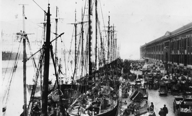 The Boston waterfront in the days before diesel engines and forklifts.
