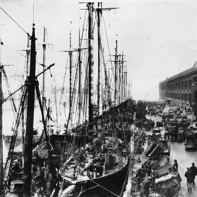The Boston waterfront in the days before diesel engines and forklifts.