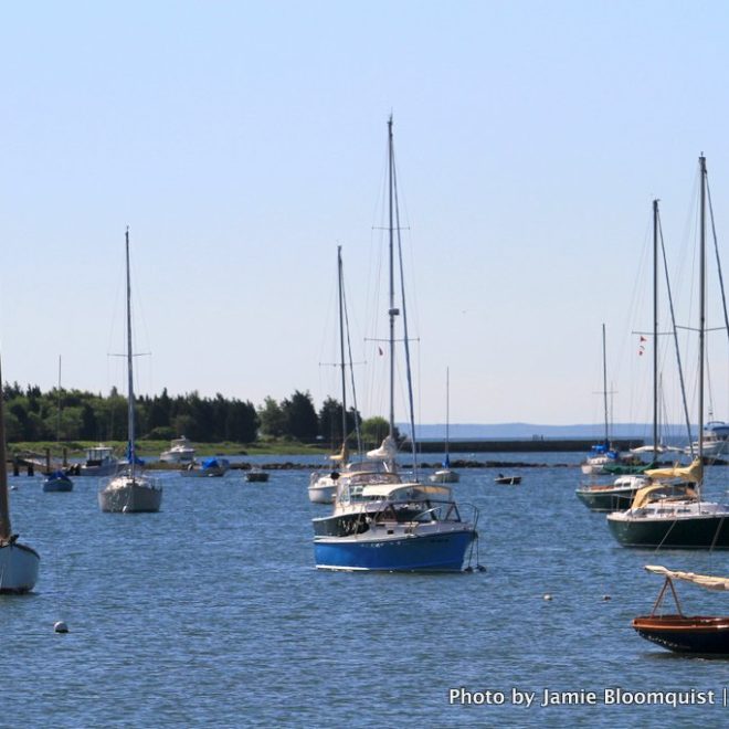 With a light westerly breeze blowing, Padanaram Harbor is a tranquil place on an early summer morning.