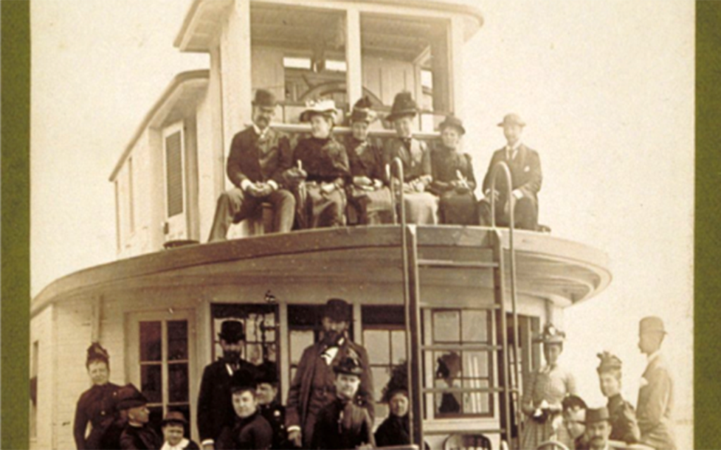 Passengers on Bow of Steamboat