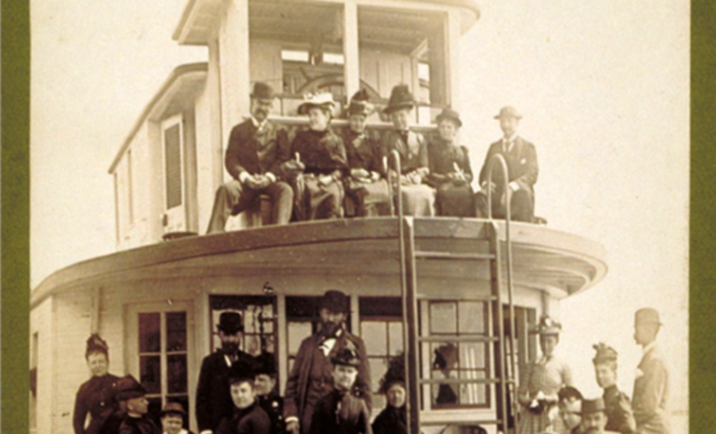 Passengers on Bow of Steamboat