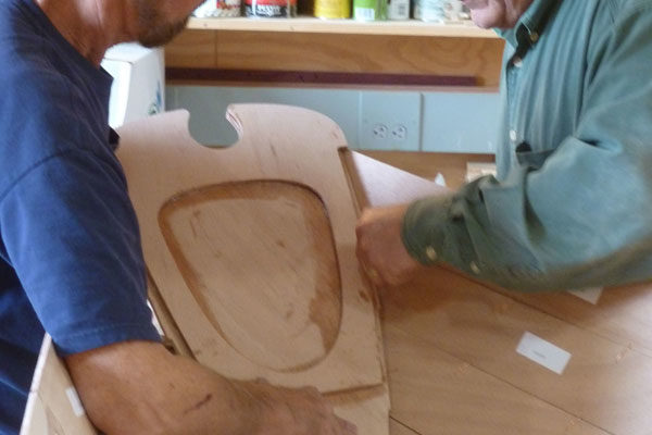 An expert boatbuilder guides students through the process.