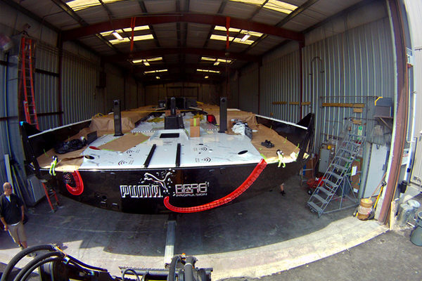 VOR 70, Team PUMA's Mar Mostro rolling out of the shed at New England Boatworks. Photo courtesy PUMA Racing