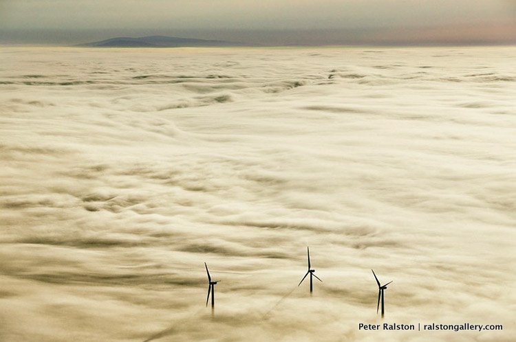Prophets | New Work 2010 | open edition (17″ x 22″). The wind turbines poke above the fog on Vinalhaven Island.