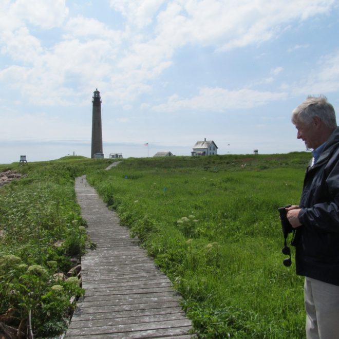 Rep. Michaud walking the board walk to the light house
