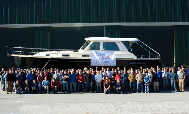 The Sabre Yachts crew celebrates the shipping of the 3000th hull.