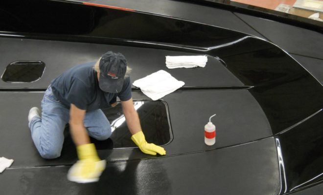 Applying wax to mold